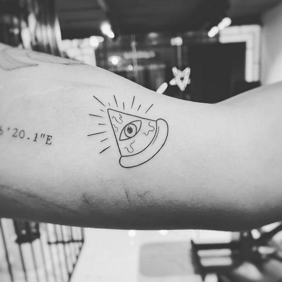 illuminati eye on pizza fineline tattoo male bicep