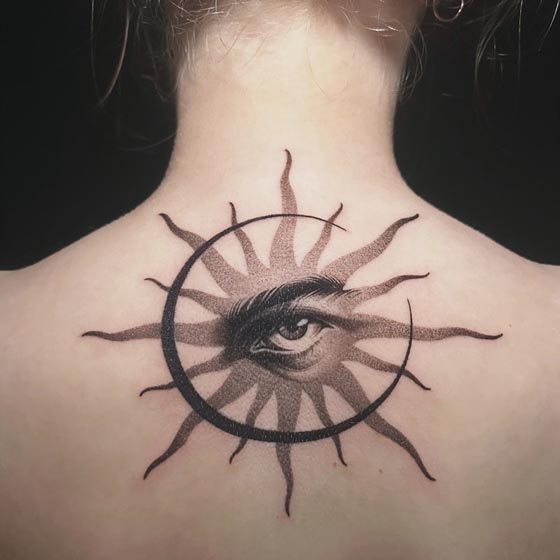 sun moon realistic eye tattoo design female back