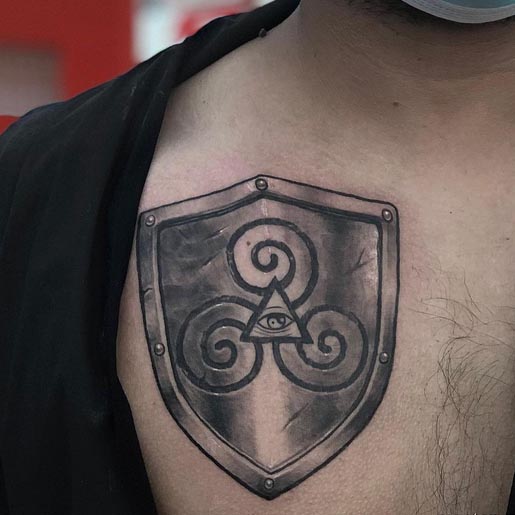 warrior shield eye triangle tattoo design male chest
