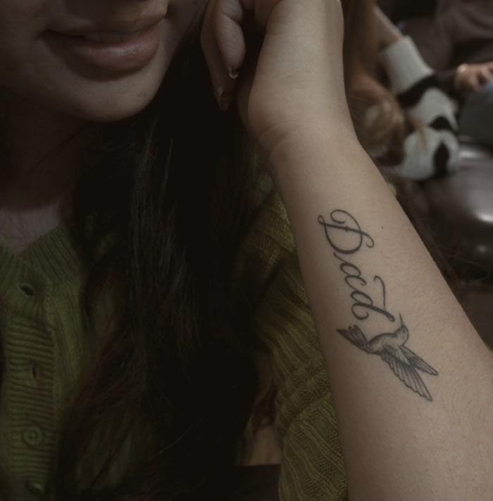 dad with bird tattoo