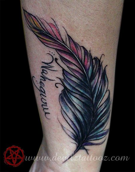 feather tattoo with waheguru ext