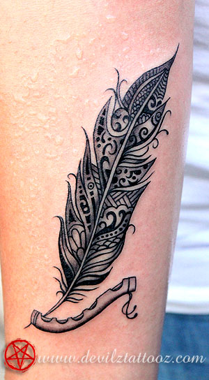 henna pattern feather tattoo with flute