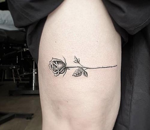 rose tattoo design on thigh