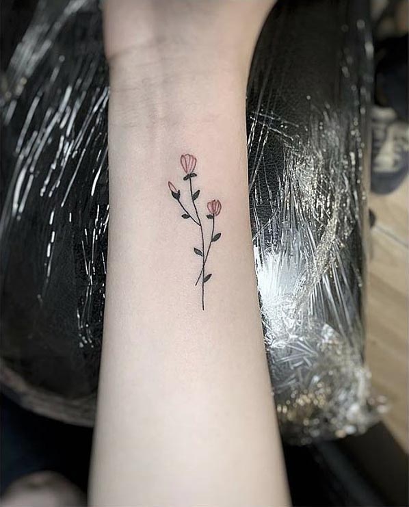 colorful minimal flower tattoo