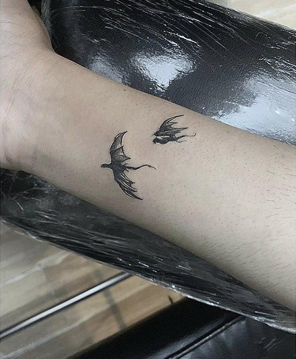 dragon tattoo on forearm