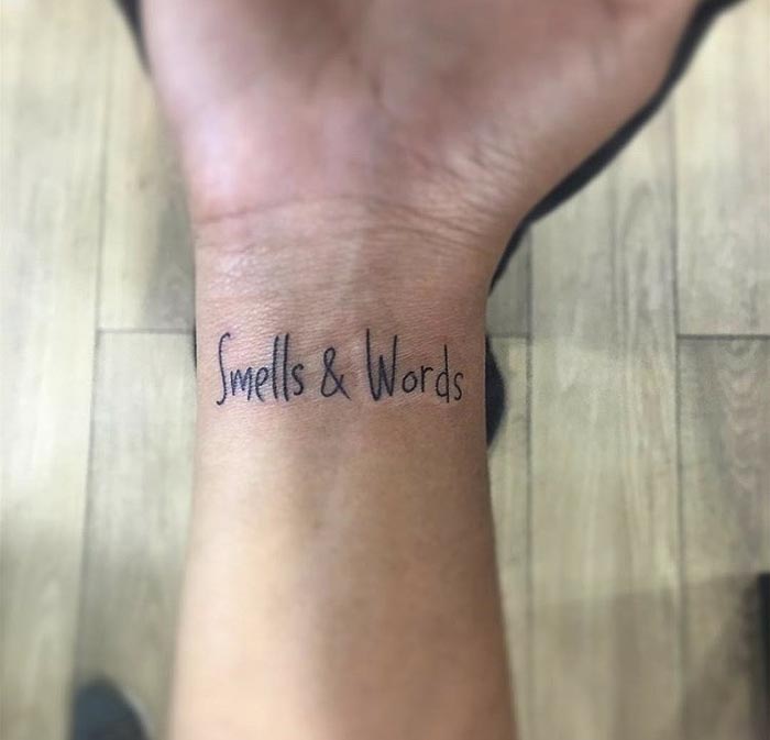 smell and words quote tattoo