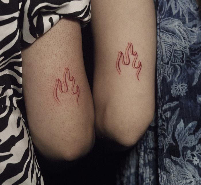 tattoo twinning fire symbol