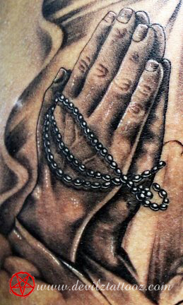 praying hands beads tattoo art