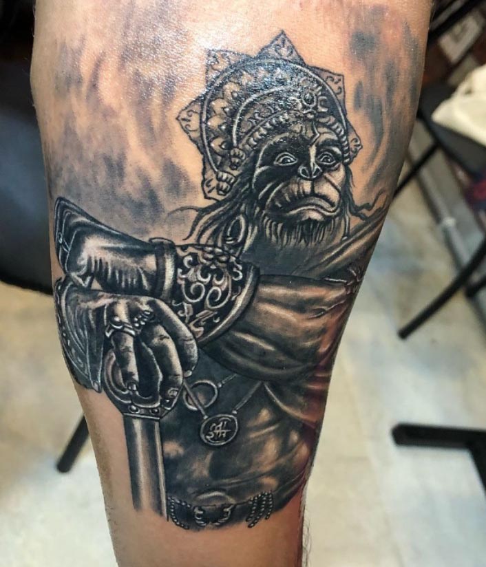 hanuman half body holding gada tattoo man forearm