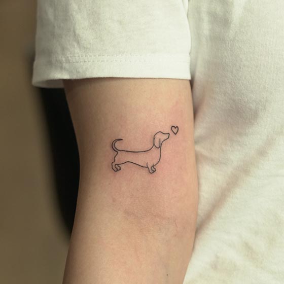 dog heart tattoo design outline female bicep