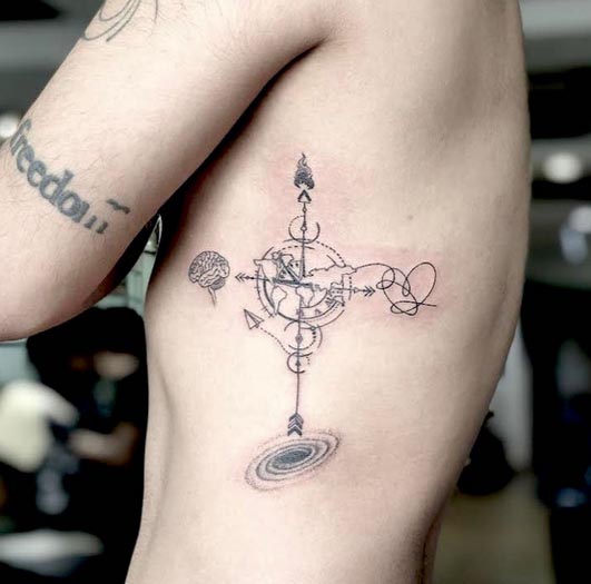 heart and brain world map tattoo design male side