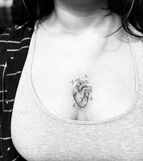 heart tattoo design minimalist female sternum