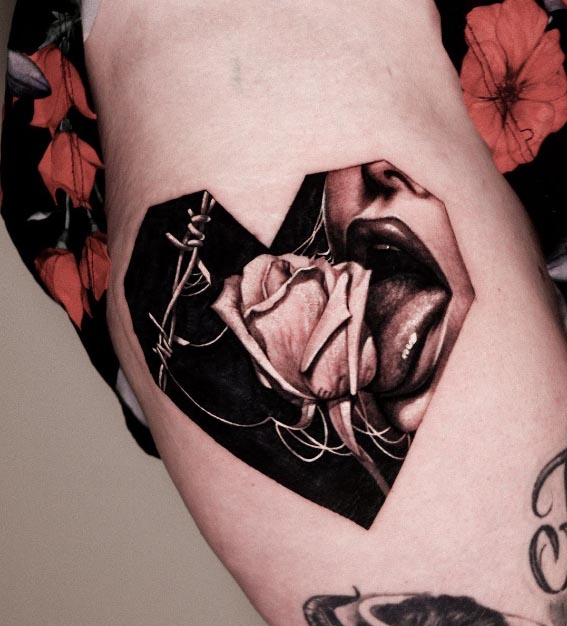 rose lady face barbed wire in heart shaped panel tattoo female forearm