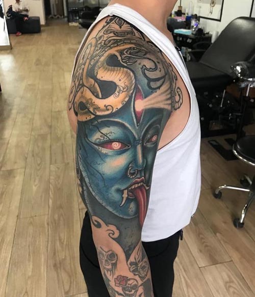 deity bluish maa kali with third eye dragon tattoo design male shoulder bicep