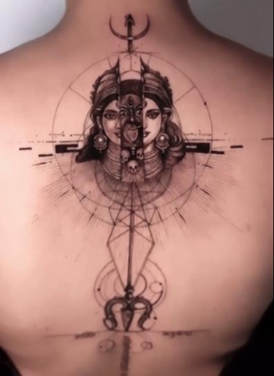 kali between splitted woman face trishul geometric pattern tattoo fine line female back