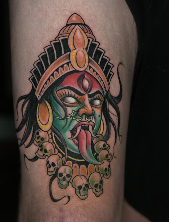 maa kali head wearing skulls garland color tattoo traditional male thigh