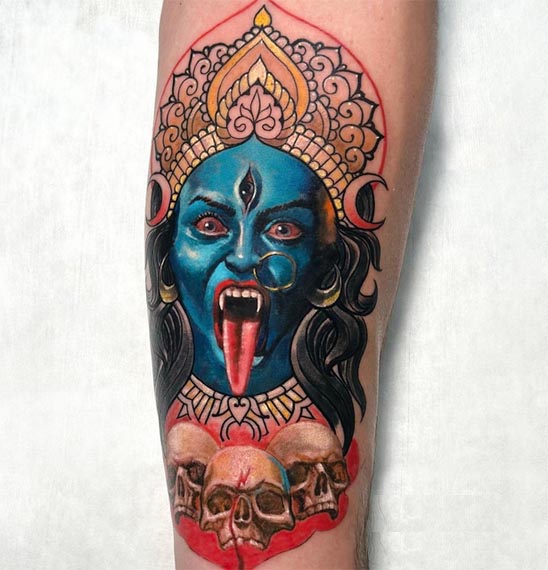 maa kali head with 3 skulls tattoo color male forearm