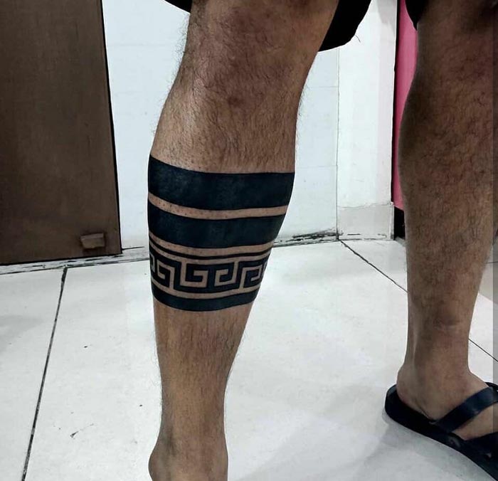 band tattoo on leg