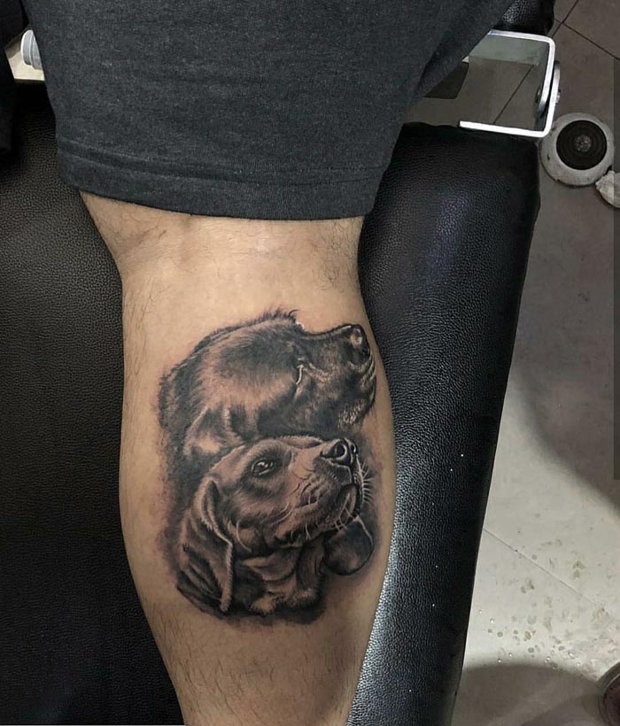 dog tattoo on leg