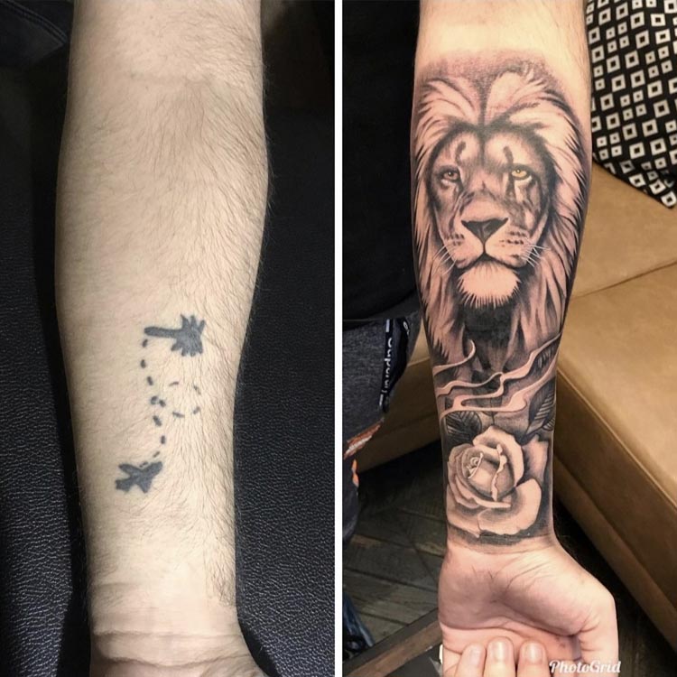 coverup old tattoo with large lion head and rose man forearm