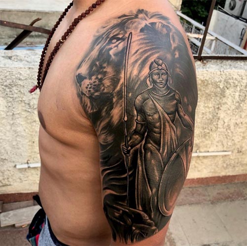 lion and native indian man tattoo half sleeve shoulder bicep