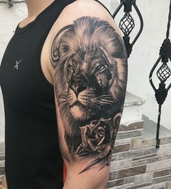 lion and rose tattoo design male arm bicep black and grey