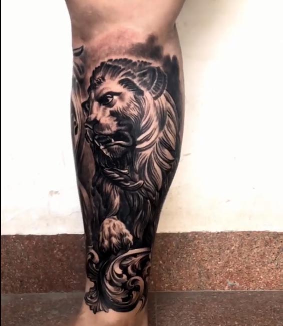 lion tattoo black and grey male half leg calf