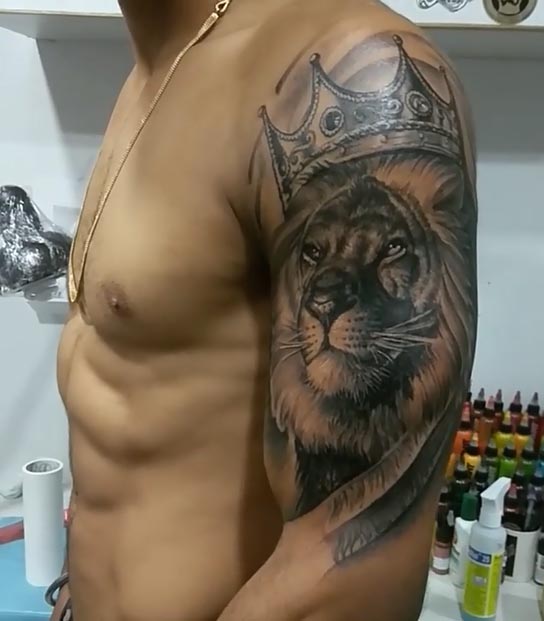 lion with crown tattoo design male half sleeve