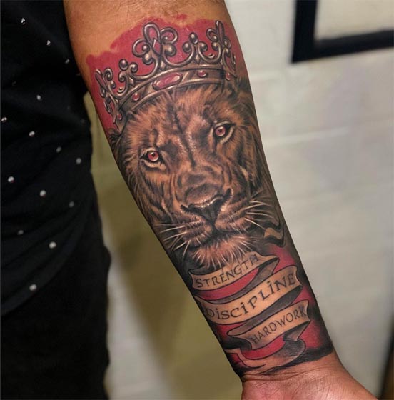 lion with crown words strength discipline hard work tattoo male half sleeve