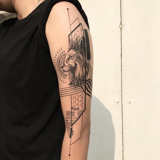 lion with geometric pattern fine line tattoo male arm bicep