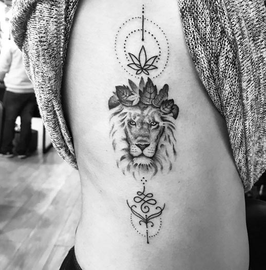 lioness floral crown lotus unalome tattoo design female side