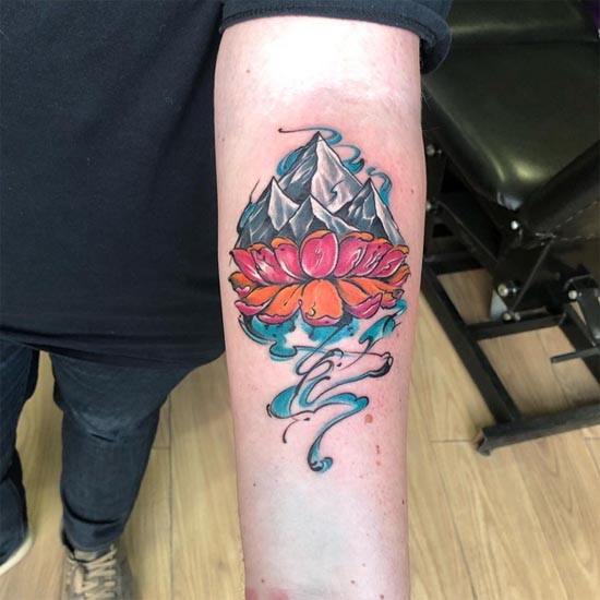 abstract mountain lotus tattoo color male forearm
