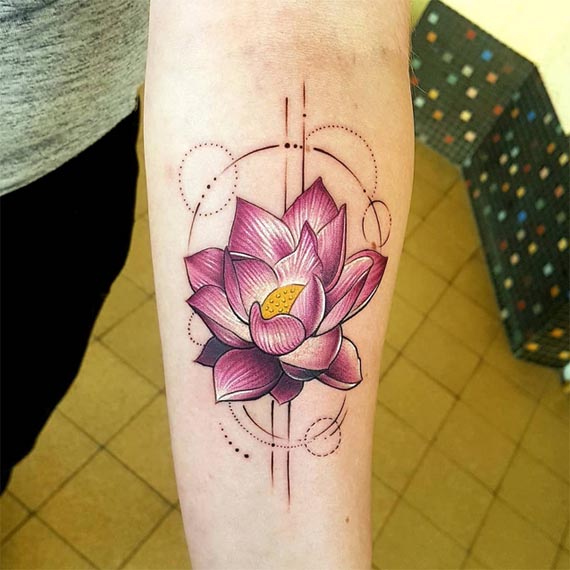 free hand lotus with geometric shapes tattoo color female forearm