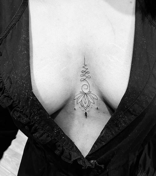 inverted unalome lotus linework ornamental touch tattoo design female sternum