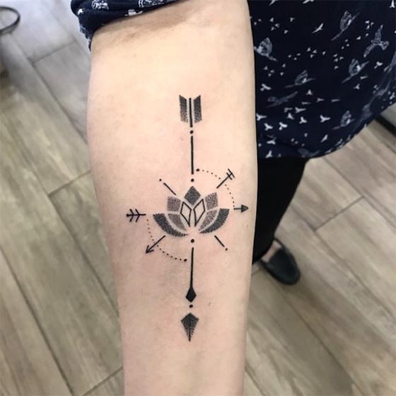 lotus arrow dotwork tattoo design female forearm