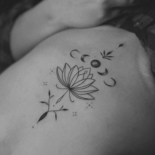 lotus blooming through phases of moon tattoo linework female stomach