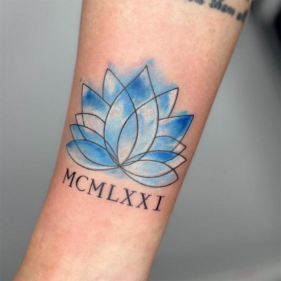 lotus roman number tattoo blue watercolor female forearm