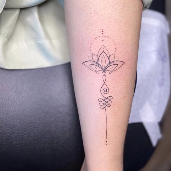 unalome lotus tattoo design minimalist linework female forearm
