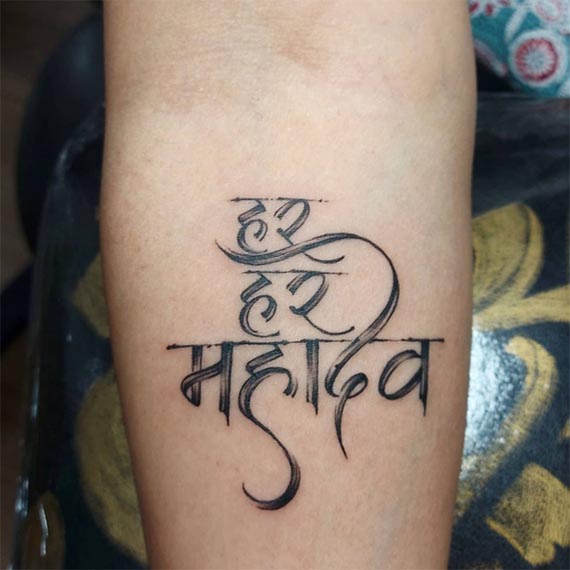 freehand calligraphy hindi har har mhadev  tattoo male forearm