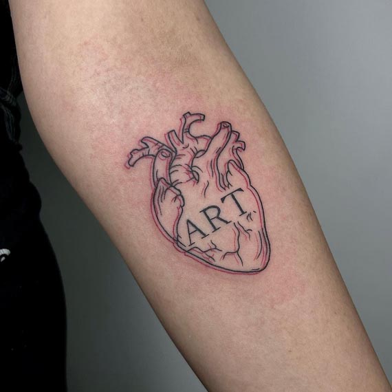 heart with text art tattoo linework female
