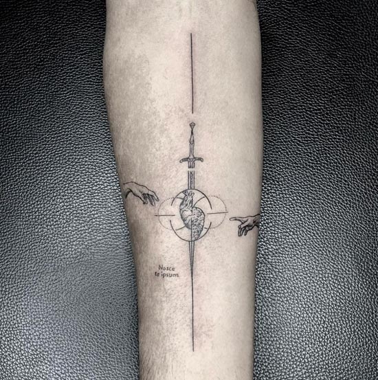 minimalist geometric hand of god sword heart brain tattoo male hand forearm