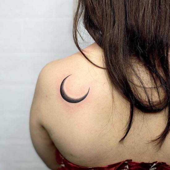 moon tattoo blackwork female back shoulder
