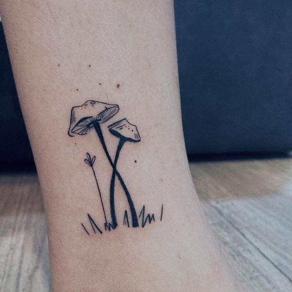mushroom minimalist tattoo design female leg