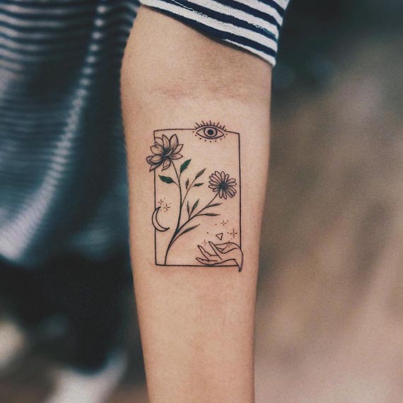 panel sunflower moon eye hand tattoo design female forearm