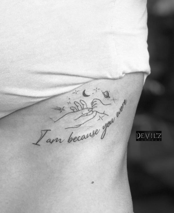 mom tattoo on ribcage