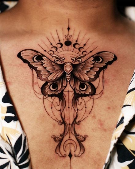 lunar moth tattoo design female chest