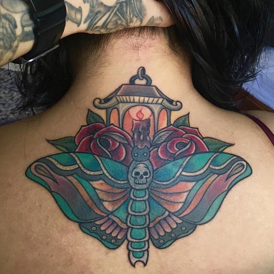 moth rose candle tattoo design female back