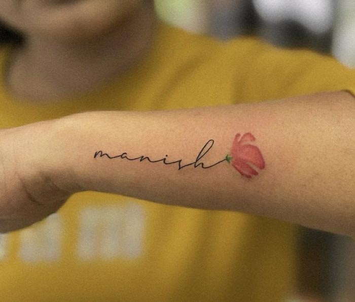 manish name tattoo with flower