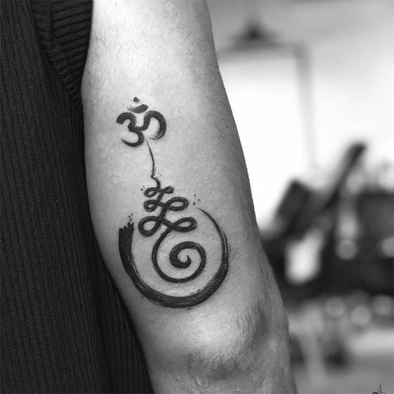 enso circle unalome om tattoo design male arm bicep