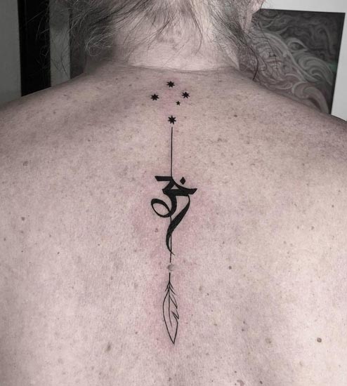 om feather stars tattoo tattoo design female back spine